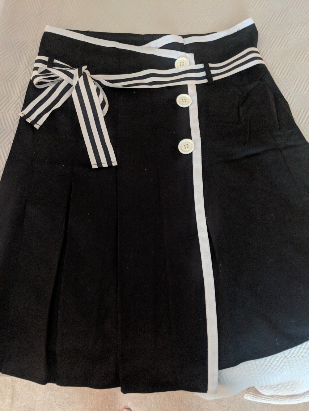 Black A-Line Skirt with White Trim and Striped Belt